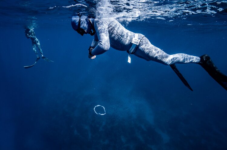 Freediver Holding his breath underwater